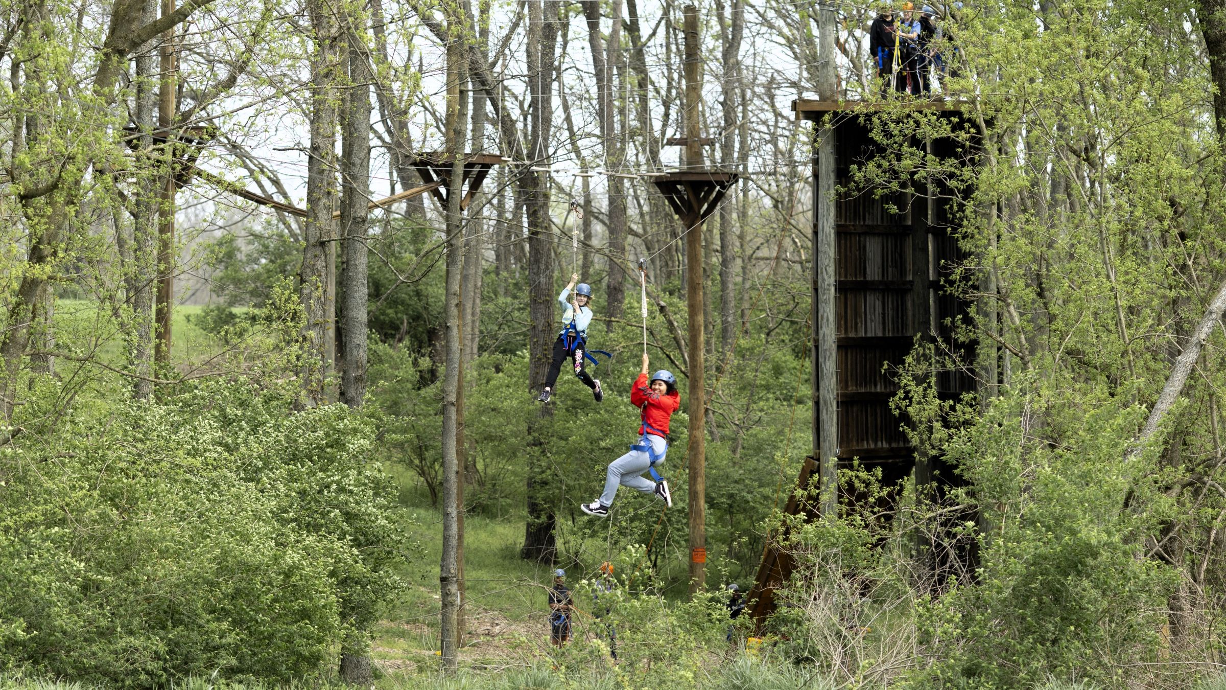 Students gliding on the zip line at Life Adventure Center. Photo by Sabrina Hounshell.