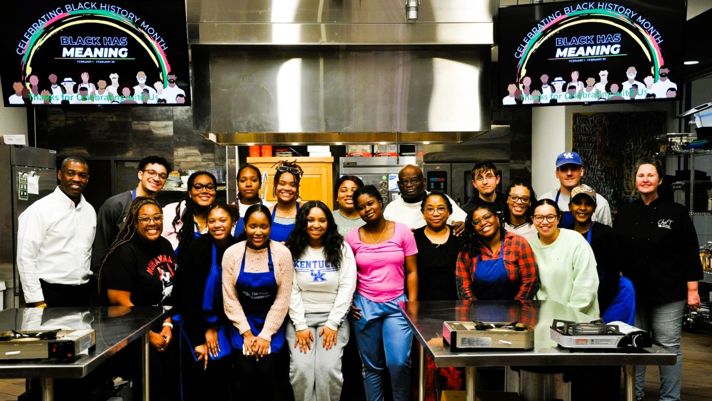 UK students and staff pose for group photo after cooking for a Cooking Up Community event on Monday, Feb. 19, 2024, at The 90 at the University of Kentucky in Lexington, Kentucky. Photo credits: Kentucky Kernel and Isabella Sepahban.